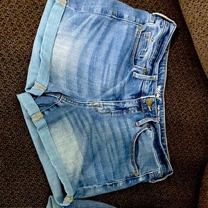 Two pairs of jean shorts. Both size 10. Mossimo brand.